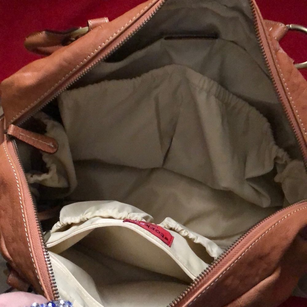It’s a leather diaper bag